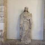 ...la Santa Caterina in pietra calcarea che una volta ornava il pozzo al centro del chiostro